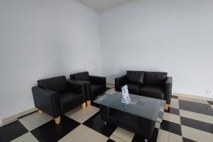 Posezení v ubytování Hotel Sutha Inn Syariah