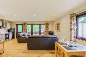 Χώρος καθιστικού στο Bluebell Lodge 4 with Hot Tub
