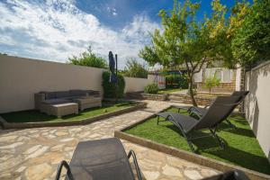 Zahrada ubytování Holiday Home Oliva