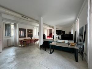 TV a/nebo společenská místnost v ubytování La casa di Wayne