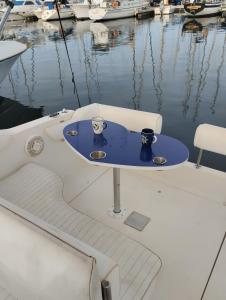 a table on the back of a boat in the water at Corazón Azul in Puerto Calero