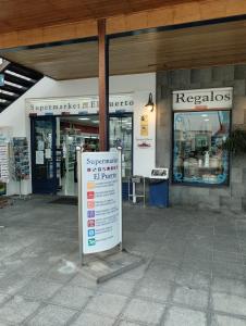 a store with a sign in front of it at Corazón Azul in Puerto Calero