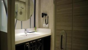 Koupelna v ubytování Arosa Hotel Jakarta