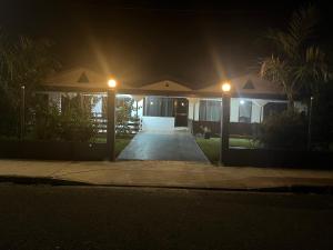 a house at night with lights on the driveway at Bula Homestay in Labasa