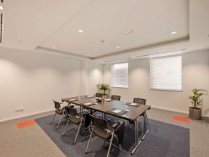 A área empresarial e/ ou a sala de conferências de Ibis World Trade Centre