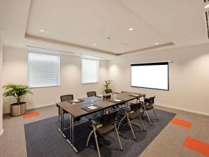 A área empresarial e/ ou a sala de conferências de Ibis World Trade Centre