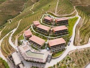 an aerial view of a building in a vineyard at Vila Gale Douro Vineyards in Armamar