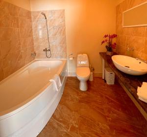 Koupelna v ubytování SPA&Hotel MŪSA PARADISE
