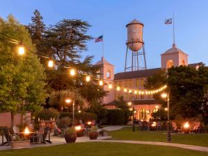 a building with a water tower at night at Fairmont Sonoma Mission Inn & Spa in Sonoma