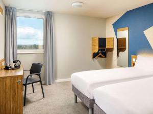 Postel nebo postele na pokoji v ubytování ibis budget London Heathrow Central