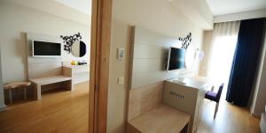 TV a/nebo společenská místnost v ubytování Seaden Sea Planet Resort & Spa