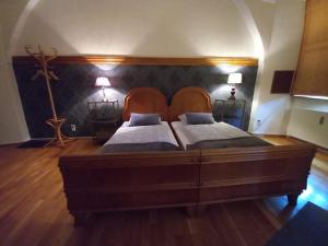 Postel nebo postele na pokoji v ubytování Klostermühle