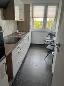 Køkken eller tekøkken på Gästewohnung KL. WZL 38_7