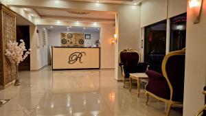a lobby with chairs and a table and a reception at Rumana Hotel in Anamur +71 photos