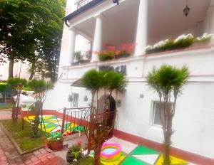 a building with a play yard with a frisbee at Willa Pasja in Inowrocław