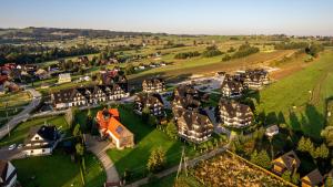 an aerial view of a small village with houses at Resorts J Białka Tatrzańska z sauną, Sun & Snow in Białka Tatrzanska