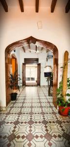 an open hallway with a tile floor and a window at Angel Heritage Home - Serenity Beach, Pondicherry. in Puducherry