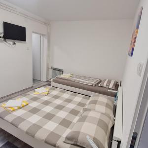Posteľ alebo postele v izbe v ubytovaní Pepa Zg