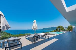 a villa with a view of the ocean at Villa Anthelia in Pentátion
