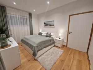 Posteľ alebo postele v izbe v ubytovaní Traumhaus in den Weinbergen - max 8 Personen - mit Self-Check-in