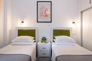 Postel nebo postele na pokoji v ubytování Alkinoos by Anita Holiday Homes