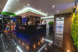 a lobby of a hotel with a bar in it at Casino & Hotel ADMIRAL Ptuj in Ptuj