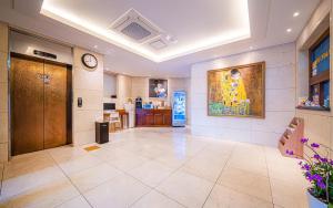 TV a/nebo společenská místnost v ubytování Hotel MoMo
