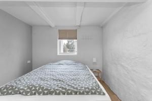 Postel nebo postele na pokoji v ubytování Kósý suite downtown Reykjavík