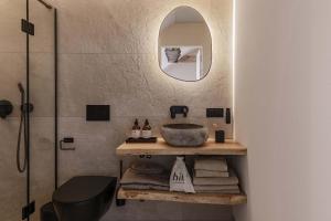a bathroom with a sink and a shower at Hill Palanga & SPA in Palanga
