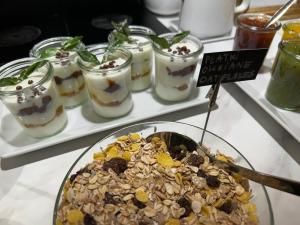 a plate of food on a table with desserts at Pollera in Krakow