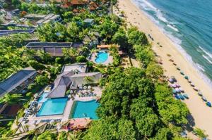 an aerial view of the resort and the beach at Suite Bedroom Legian by DHMhotelier in Seminyak