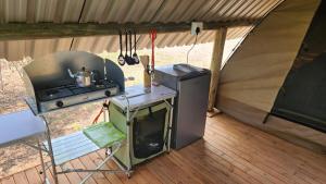 an overhead view of a stove in a tent at Jackal Cry River View Tent in Skeerpoort