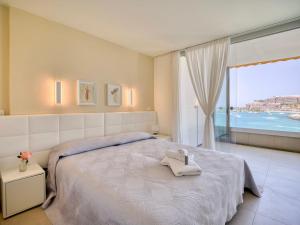 Posteľ alebo postele v izbe v ubytovaní Ocean Views with Spectacular Sunsets + 22 fotografií