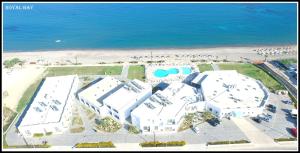 an aerial view of a resort near the beach at Royal Bay Suites in Kefalos
