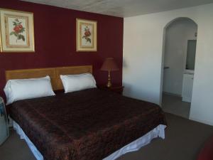 Postel nebo postele na pokoji v ubytování Super 54 Inn
