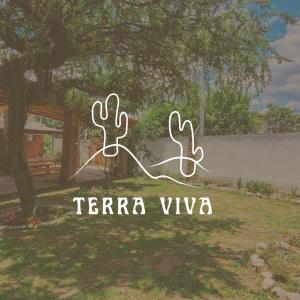 a sign that says terra viviva in a yard at Casa de Campo- Terra Viva in San Salvador de Jujuy