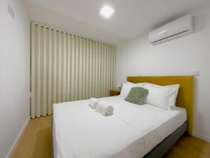 Letto o letti in una camera di Vibrant Host Solutions-Campo 24 Agosto