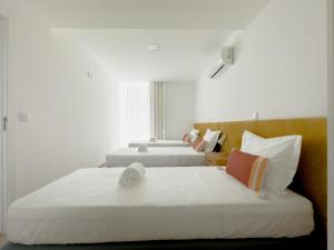 Letto o letti in una camera di Vibrant Host Solutions-Campo 24 Agosto