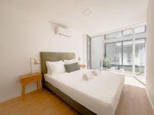Letto o letti in una camera di Vibrant Host Solutions-Campo 24 Agosto