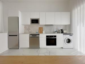 Cucina o angolo cottura di Vibrant Host Solutions-Campo 24 Agosto