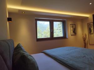 A bed or beds in a room at Appartement Waldzauber