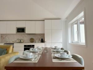 Cucina o angolo cottura di Vibrant Host Solutions-Campo 24 Agosto