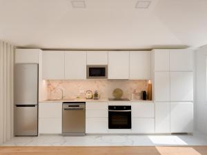 Cucina o angolo cottura di Vibrant Host Solutions-Campo 24 Agosto