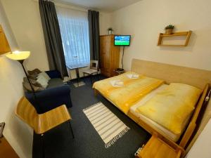 Postel nebo postele na pokoji v ubytování Apartments Monika