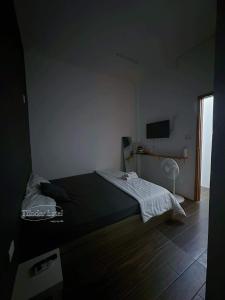 Postel nebo postele na pokoji v ubytování Tiinder Hotel