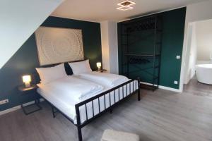 Säng eller sängar i ett rum på Ferienhaus an der Elbe - XR32
