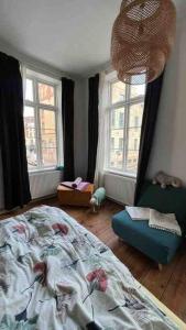 Postel nebo postele na pokoji v ubytování Saniertes Fachwerkhaus mit Hof i.d. Altstadt