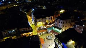 an aerial view of a city at night at Linda Port Hotel in Istanbul