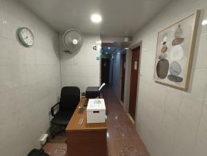 Μια τηλεόραση ή/και κέντρο ψυχαγωγίας στο Mandarin Guest House