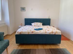 Postel nebo postele na pokoji v ubytování Wein4tel-Apartments